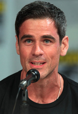 Hur lång är Eddie Cahill